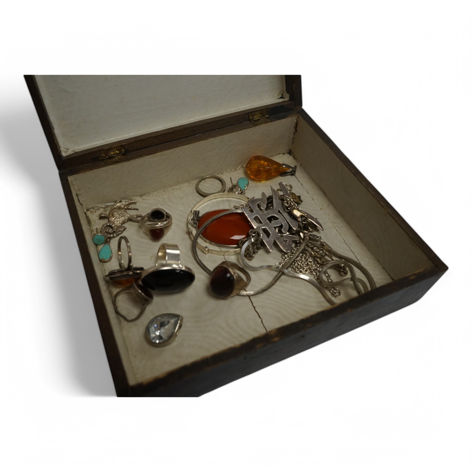 A small collection of assorted jewellery, including silver and 925 rings set with cabochon stones, a child's 925 bangle, amber jewellery, 925 necklace, etc, housed in an inlaid and cross banded box. Condition - poor to f